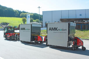 Factory Train FT816 outdoor tugger train with EV4 frame load carrier (4 adjustable forks) and weather protection system